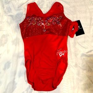 Red sequence gymnastics leotard. Brand new never used. Size AS.
